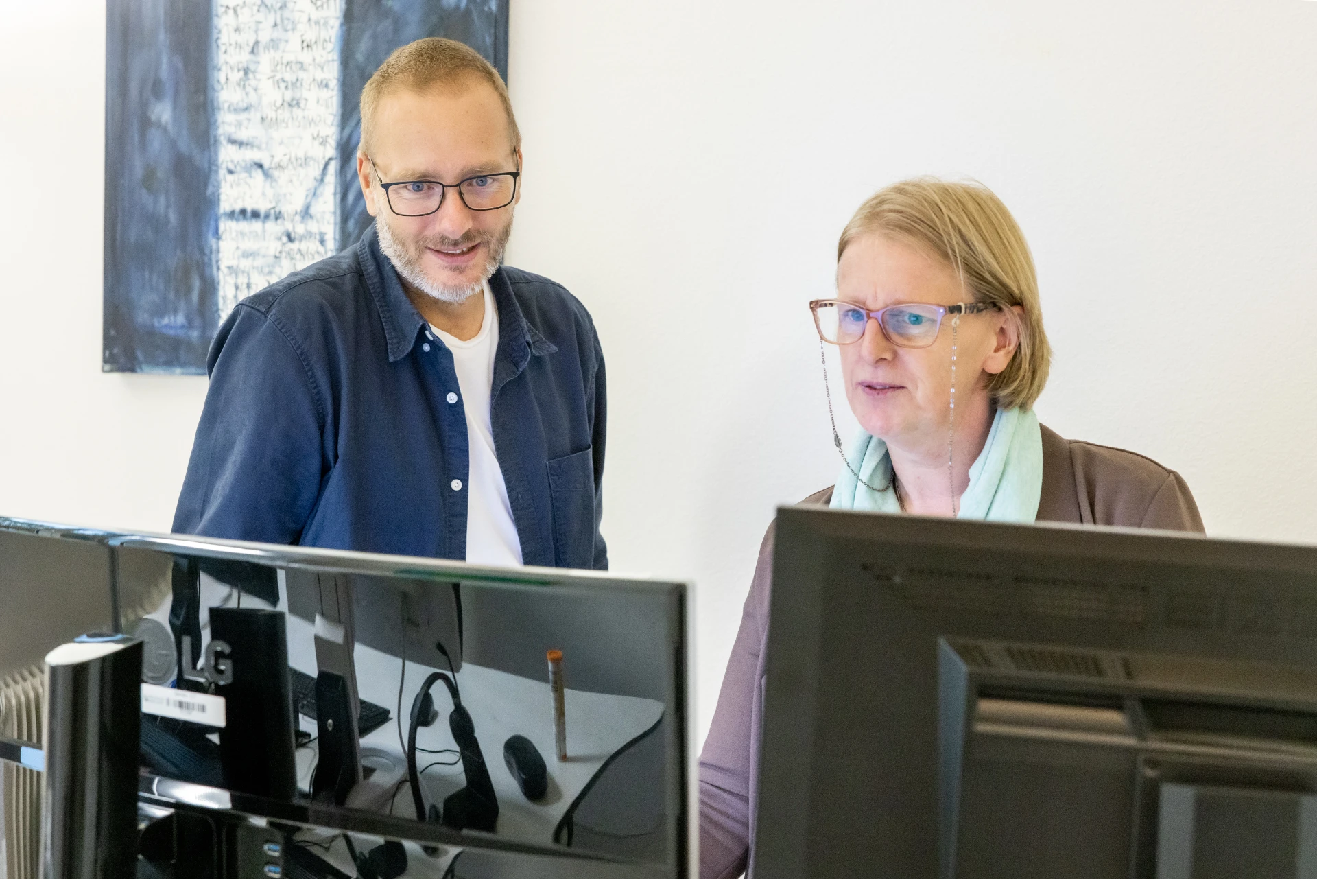 Mitarbeitende am PC